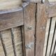 Old gate in Burmese teak and wrought iron