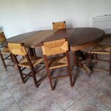 Old table with central leg, small casters, 2 extensions