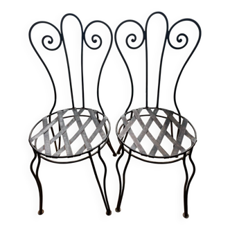 2 vintage wrought iron chairs