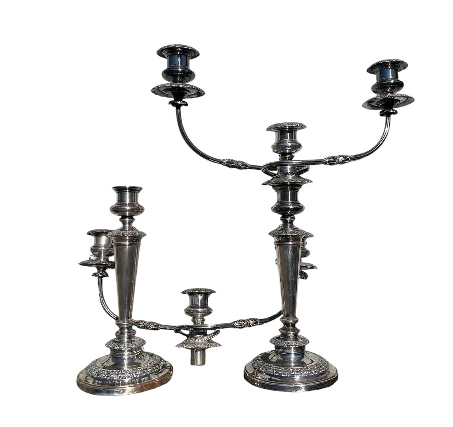 Pair of convertible three-light candelabra in silver-plated metal.