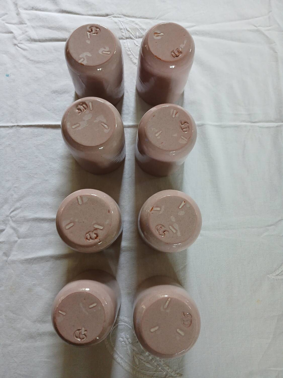 8 signed enamelled ceramic mugs