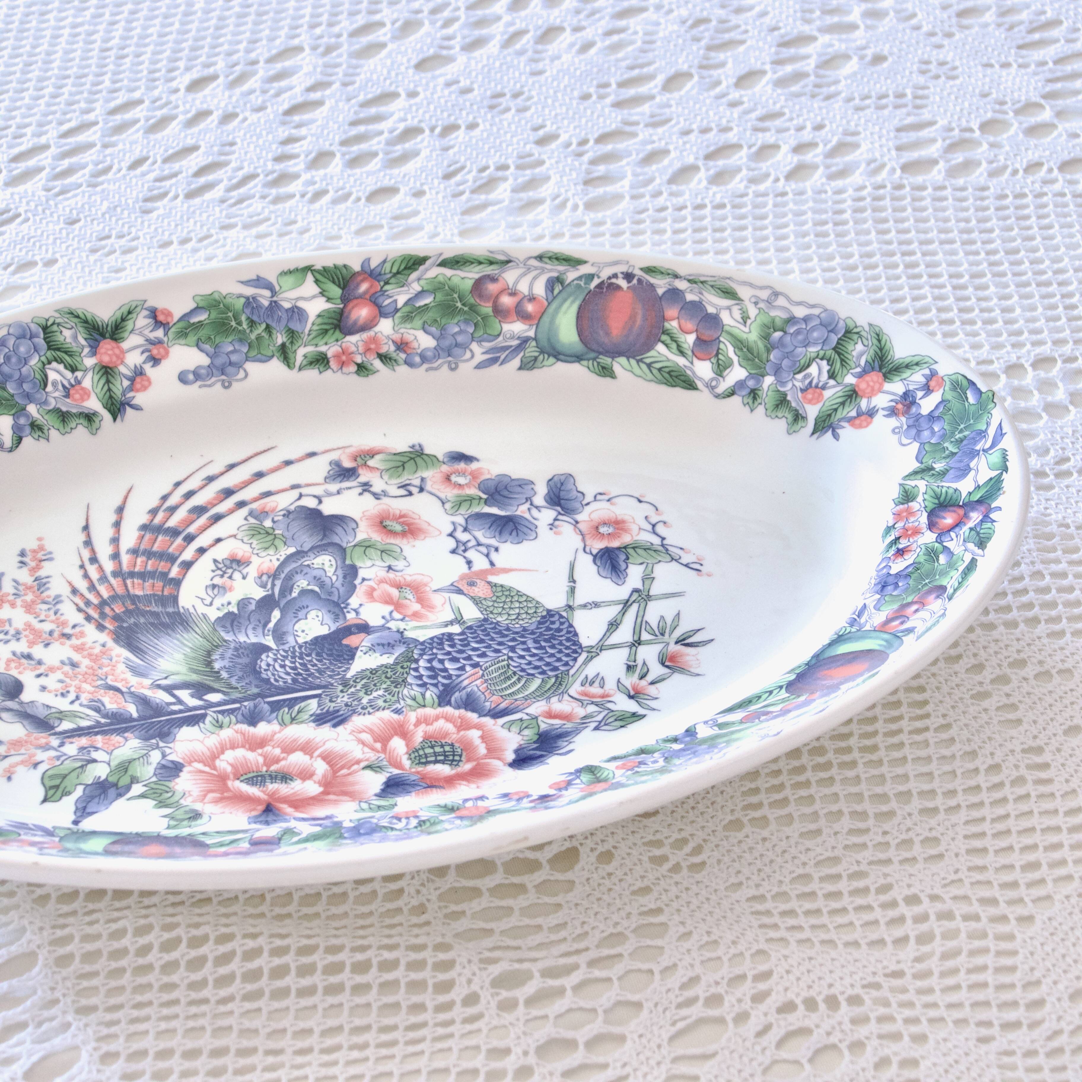 Large vintage Italian oval dish decorated with birds, flowers and fruits