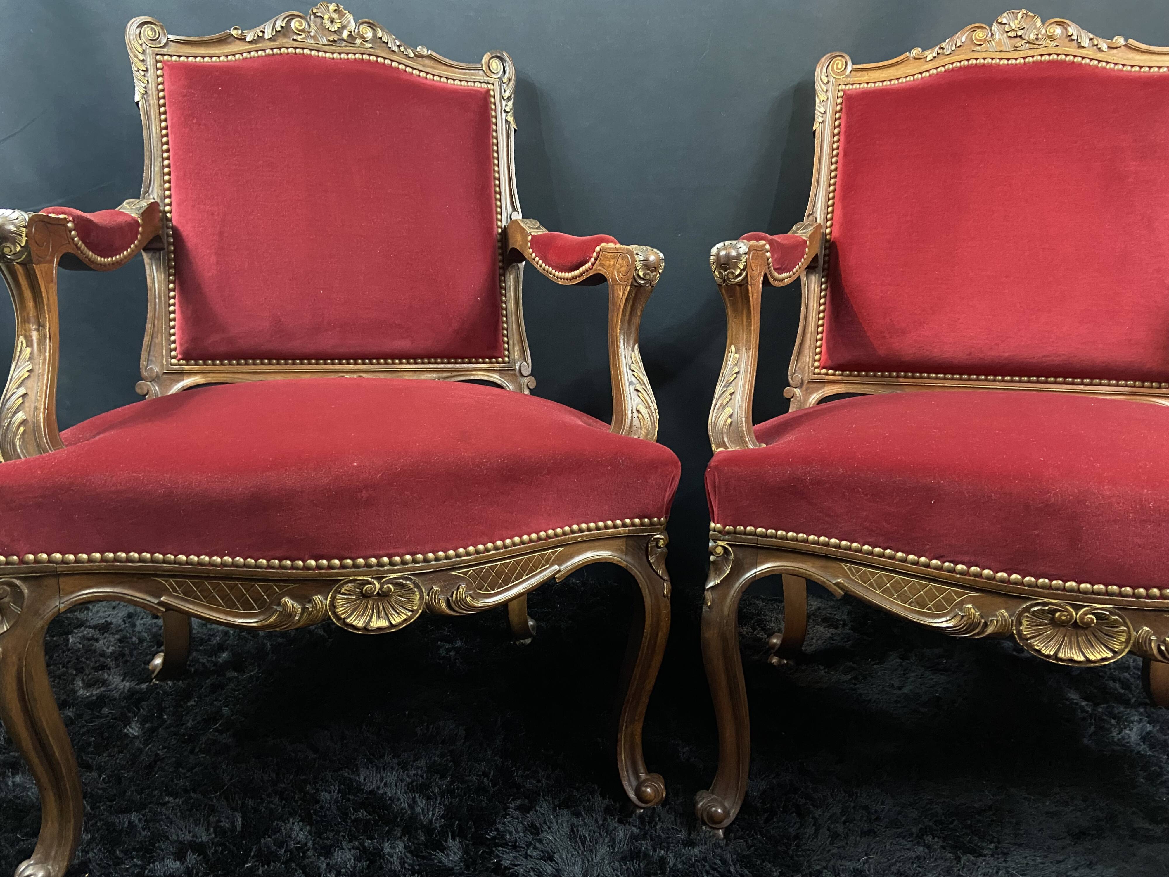 Pair of flat-back armchairs in Louis XV style in red velvet.
