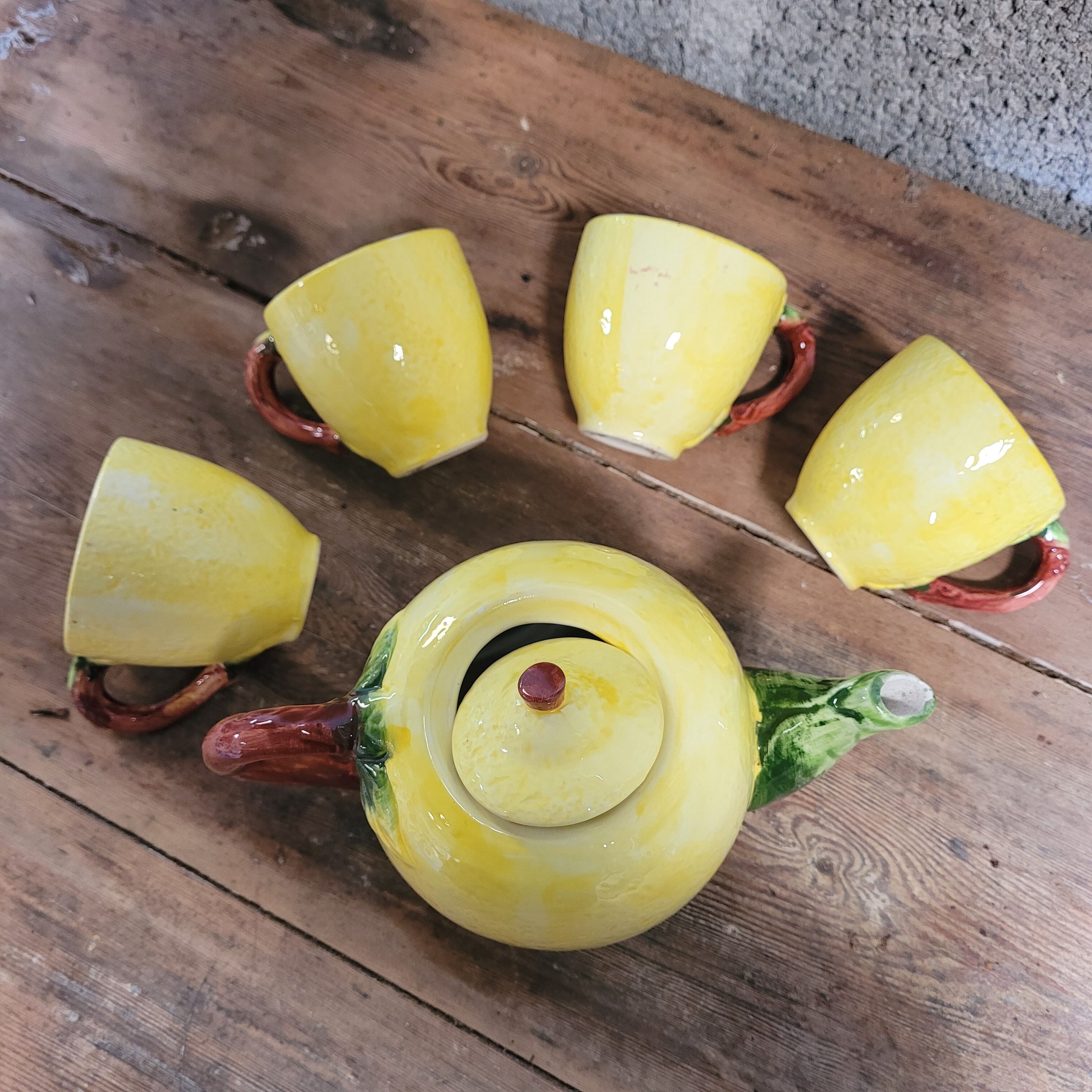 Teapot with slip cups