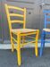 Fake pair of rustic vintage bistro chairs