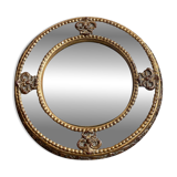 Antique domed witch's eye mirror in gilded wood