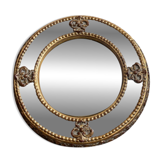 Antique domed witch's eye mirror in gilded wood