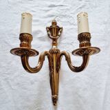 French Empire-style wall sconce or chandelier in bronze with an antique gold patina.