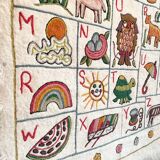 Vintage alphabet wall rug
