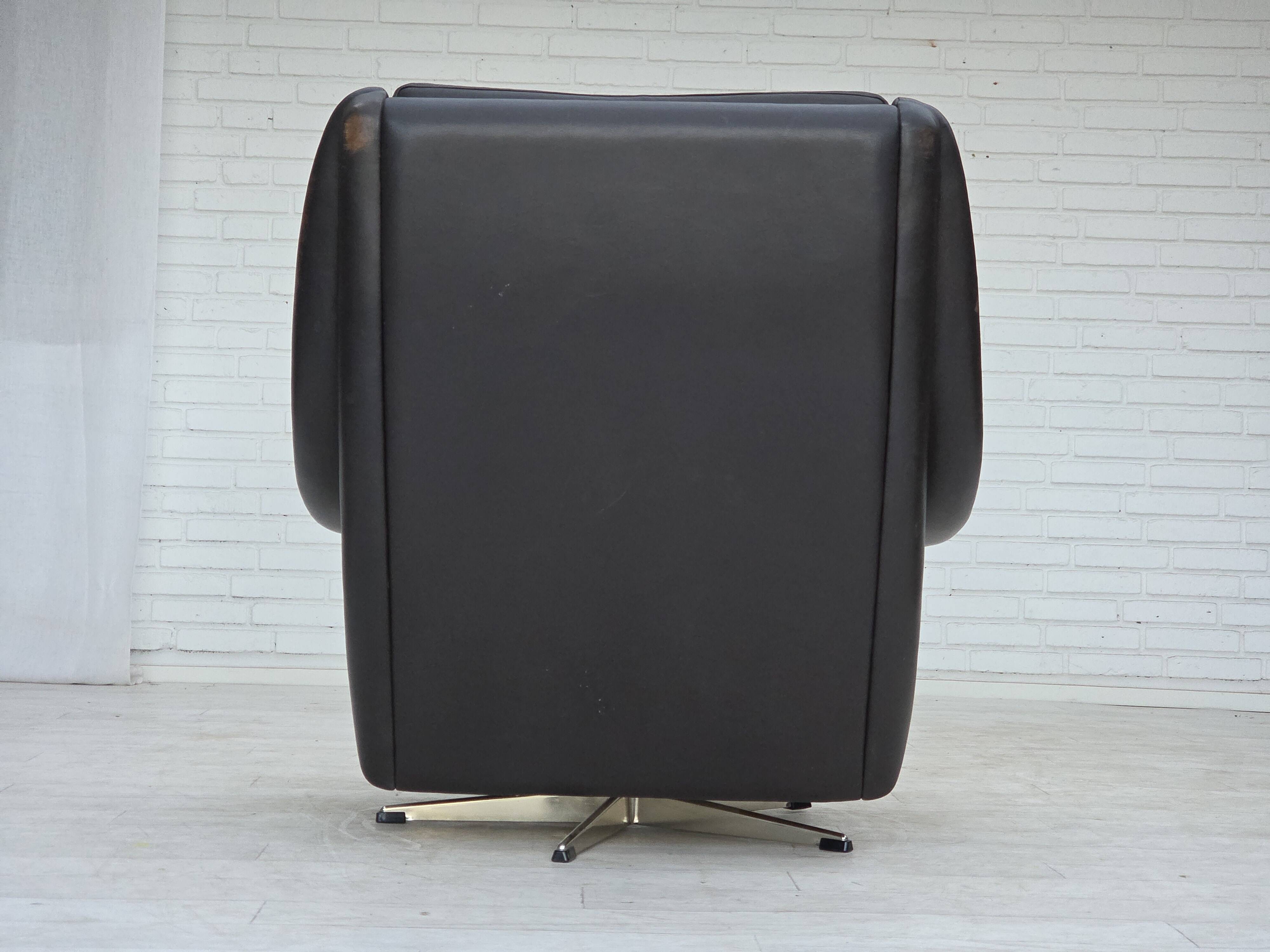 1960s, Danish highback swivel armchair by Aage Christensen, leather.