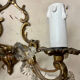 Louis XV style two-light bronze wall light with antique tassels