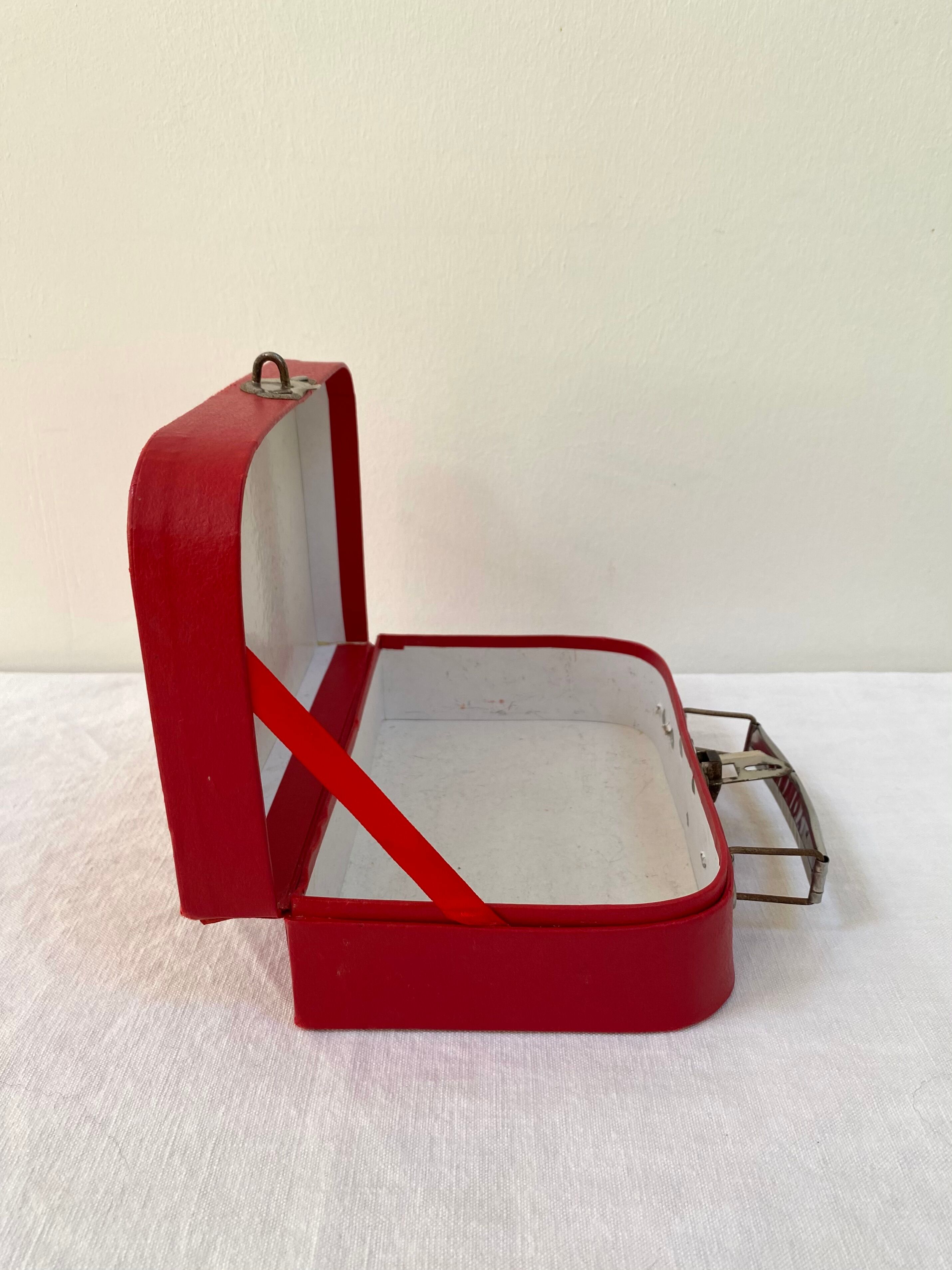 Red suitcase from the 60s