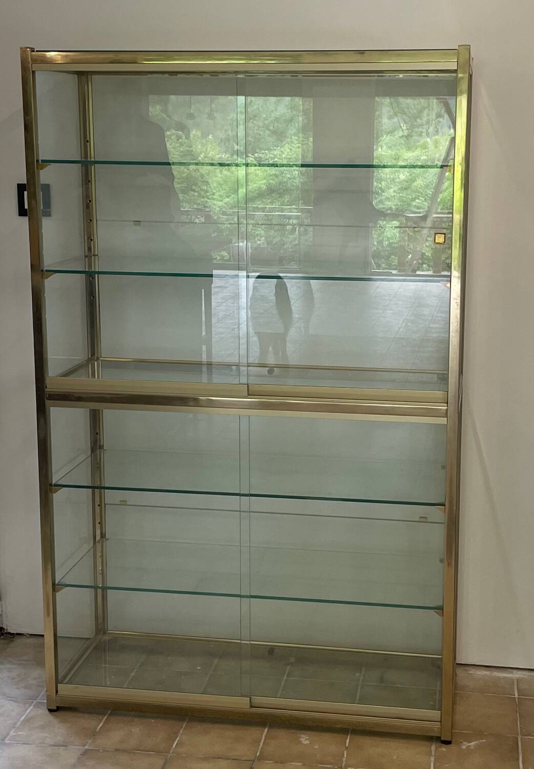 Large exhibition window in gilded brass 20th century period
