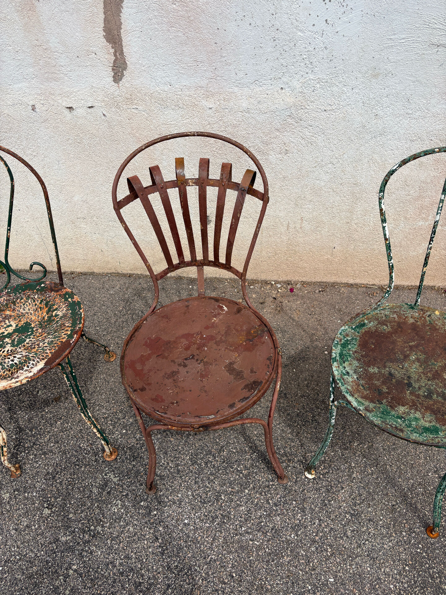 Mélange of vintage garden chairs