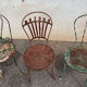 Mélange of vintage garden chairs
