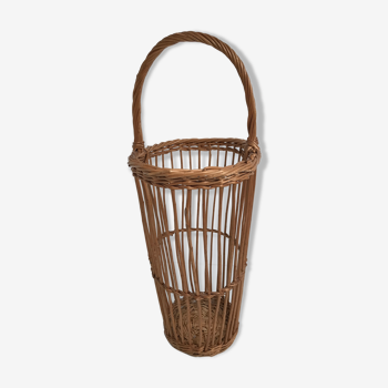 Basket with vintage wicker rattan handle