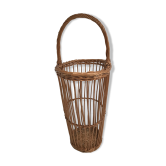 Basket with vintage wicker rattan handle