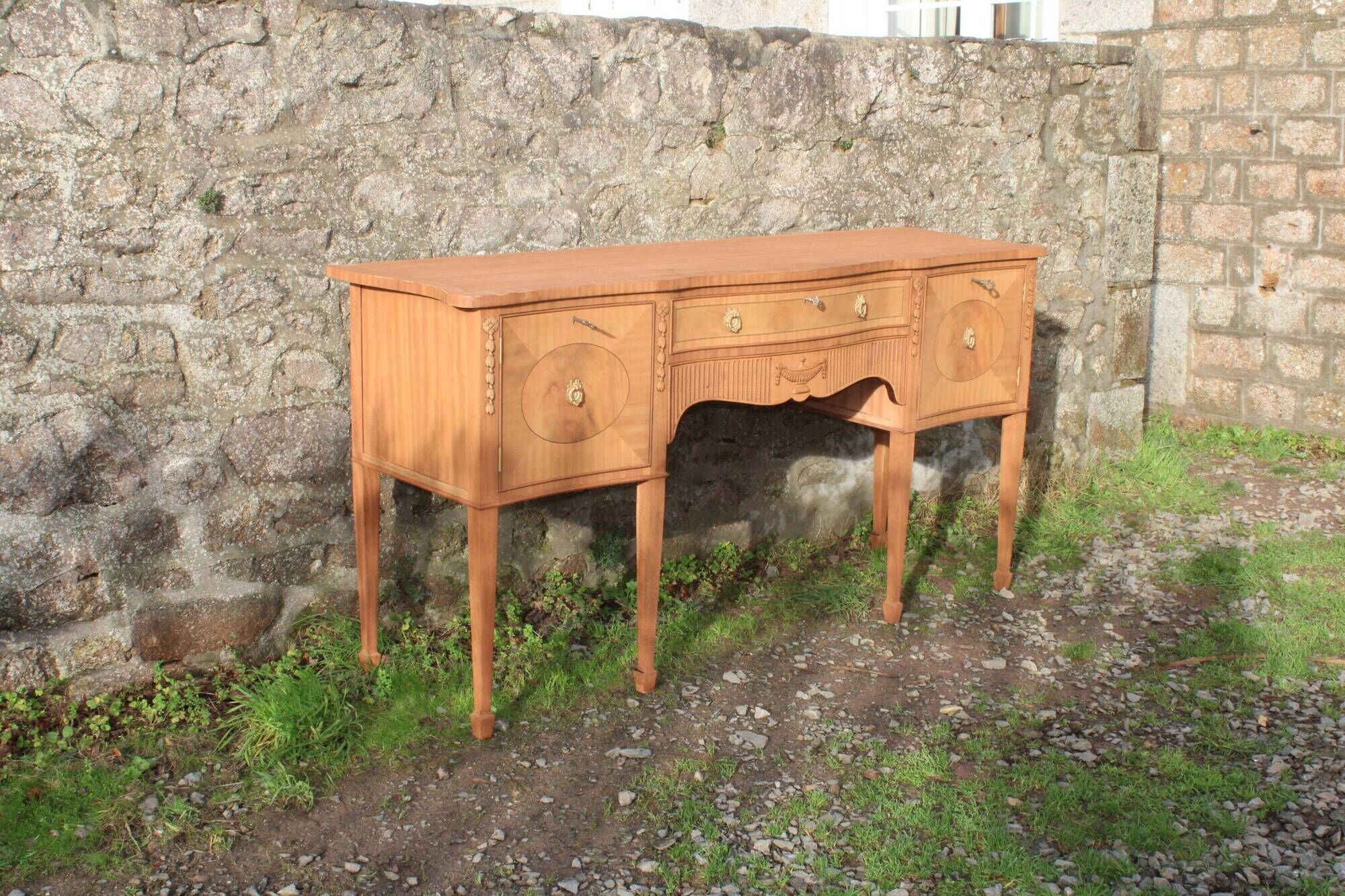 English-made enfilade in Louis XVI style with light wood veneers.