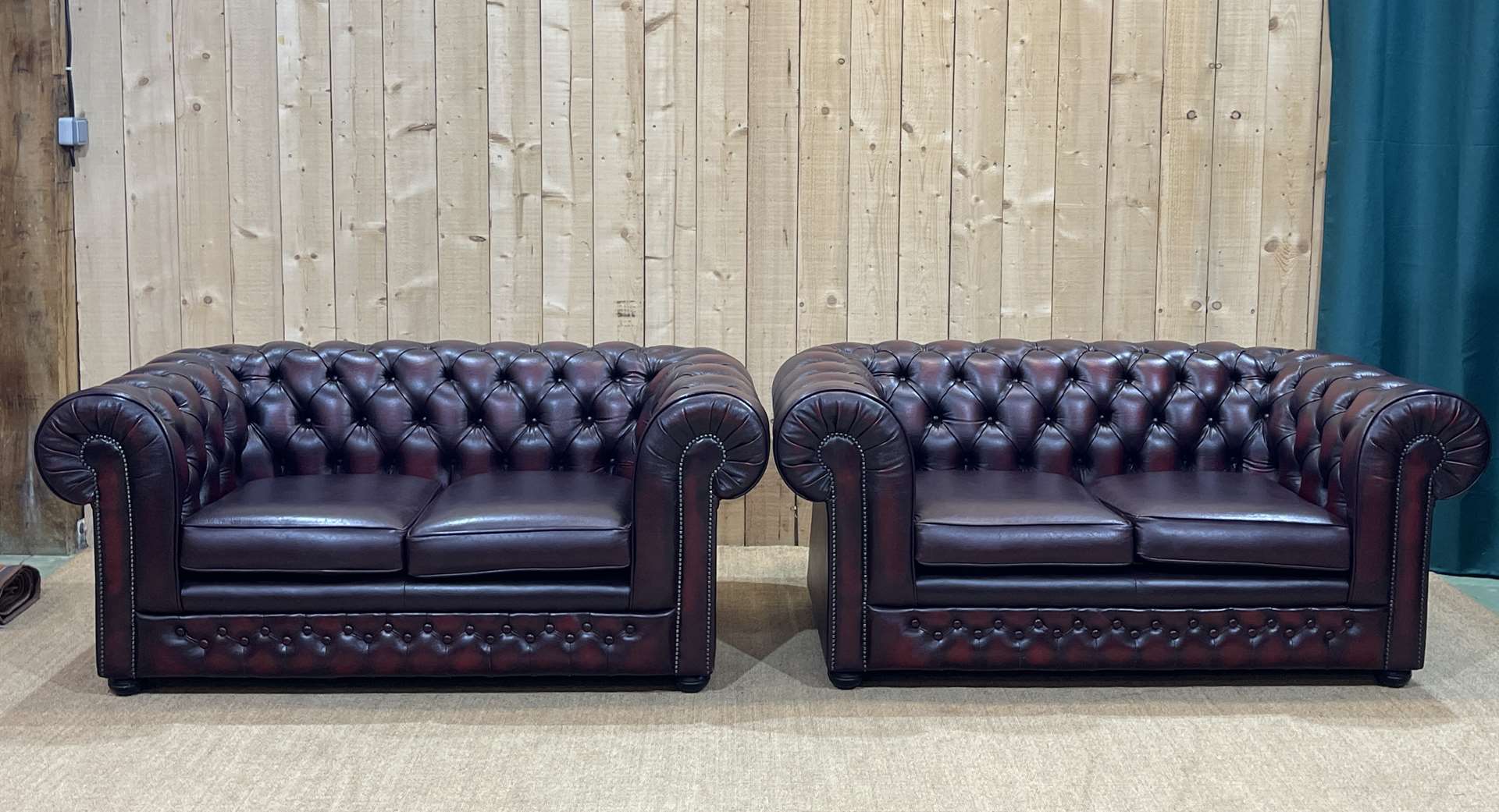 Pair of 2-seater leather Chesterfield sofas from the 1990s by Thomas LLOYD