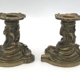 Pair of gilded bronze candlesticks with twisted decor and floral garlands, louis xv style
