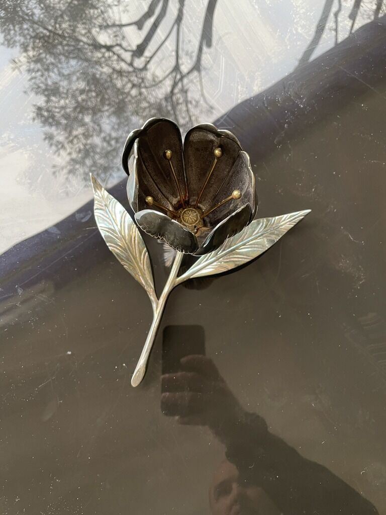 Silver metal flower with cup petal