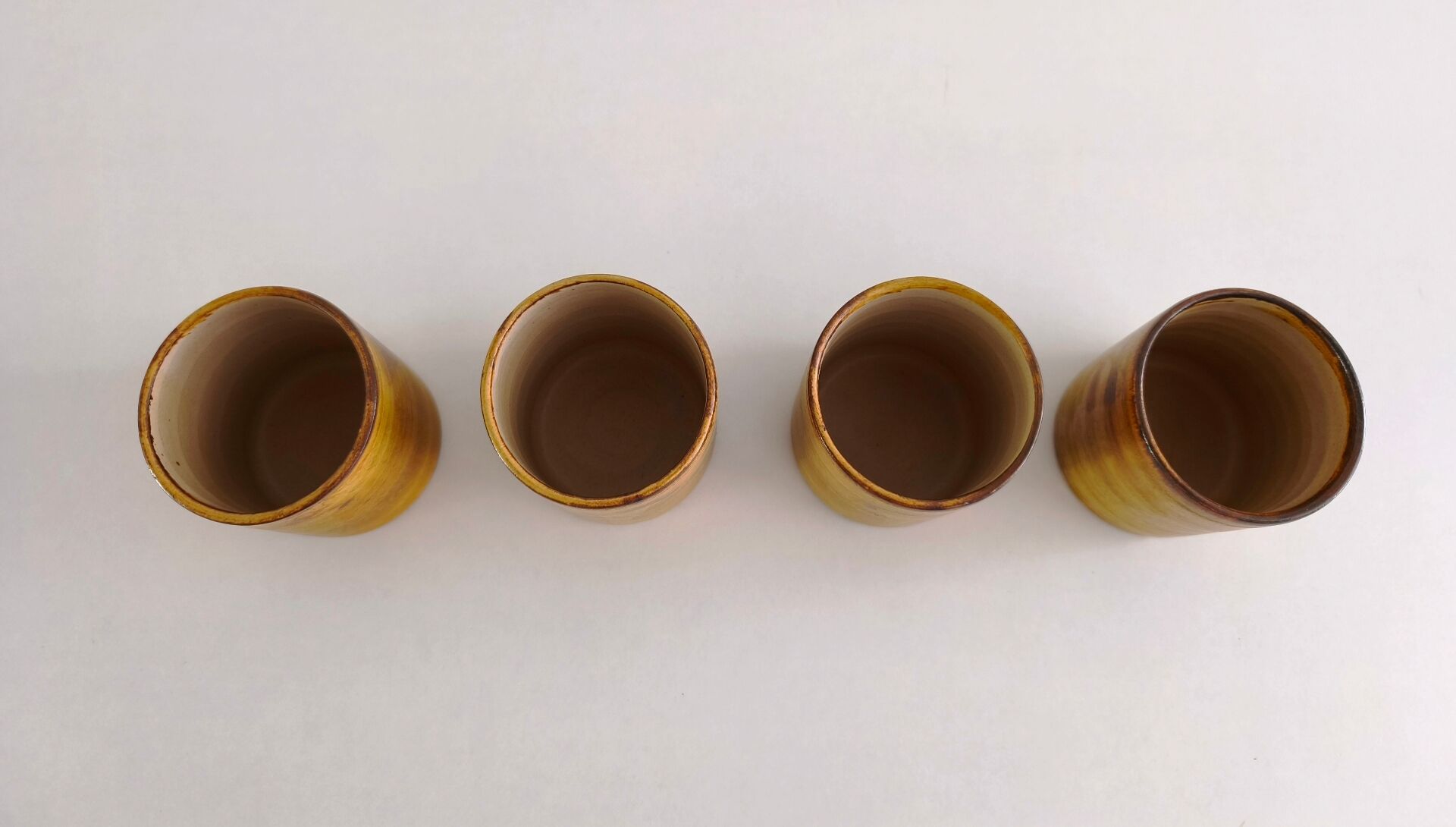 Set of 4 ceramic mugs signed Peyron