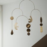 Mobile model Rana . Mobile in abstract brass.