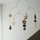 Mobile model Rana . Mobile in abstract brass.