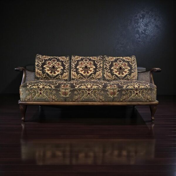 Canapé vintage en rotin avec imprimé fleuri