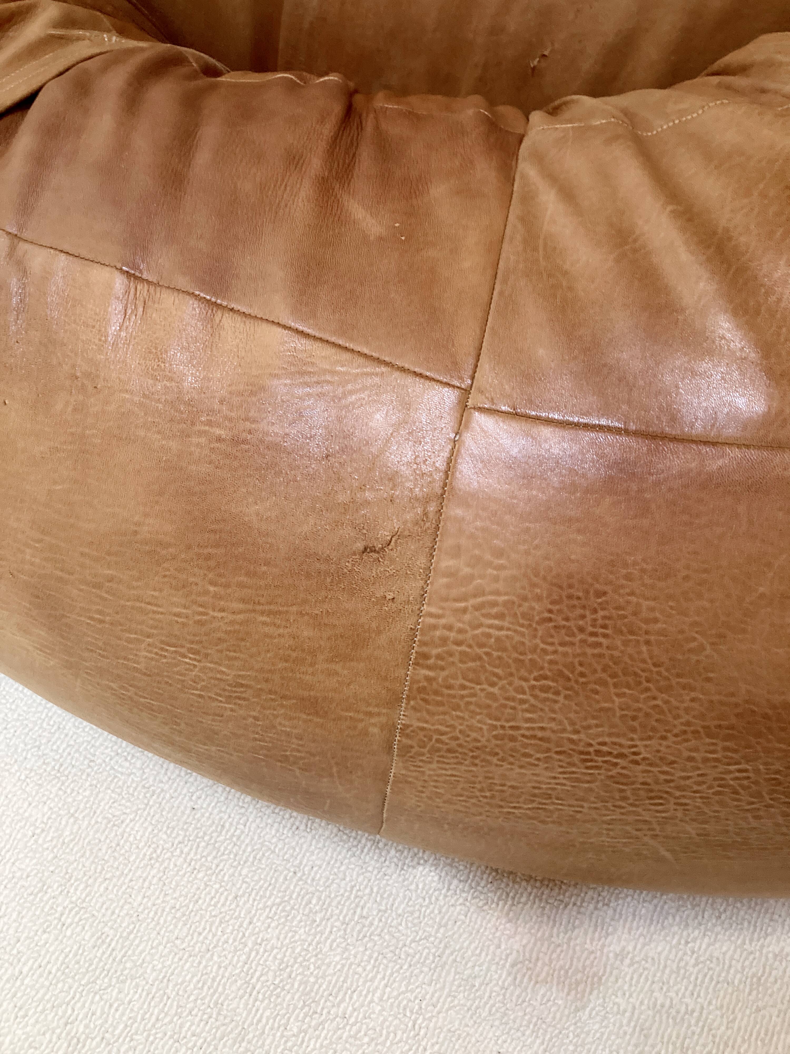 Two-seater leather pouf sofa by Raphaël Raffel for Honoré Paris