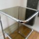 Chrome metal table and smoked glass