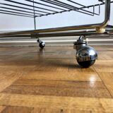 Glass and chrome wheeled vinyl holder