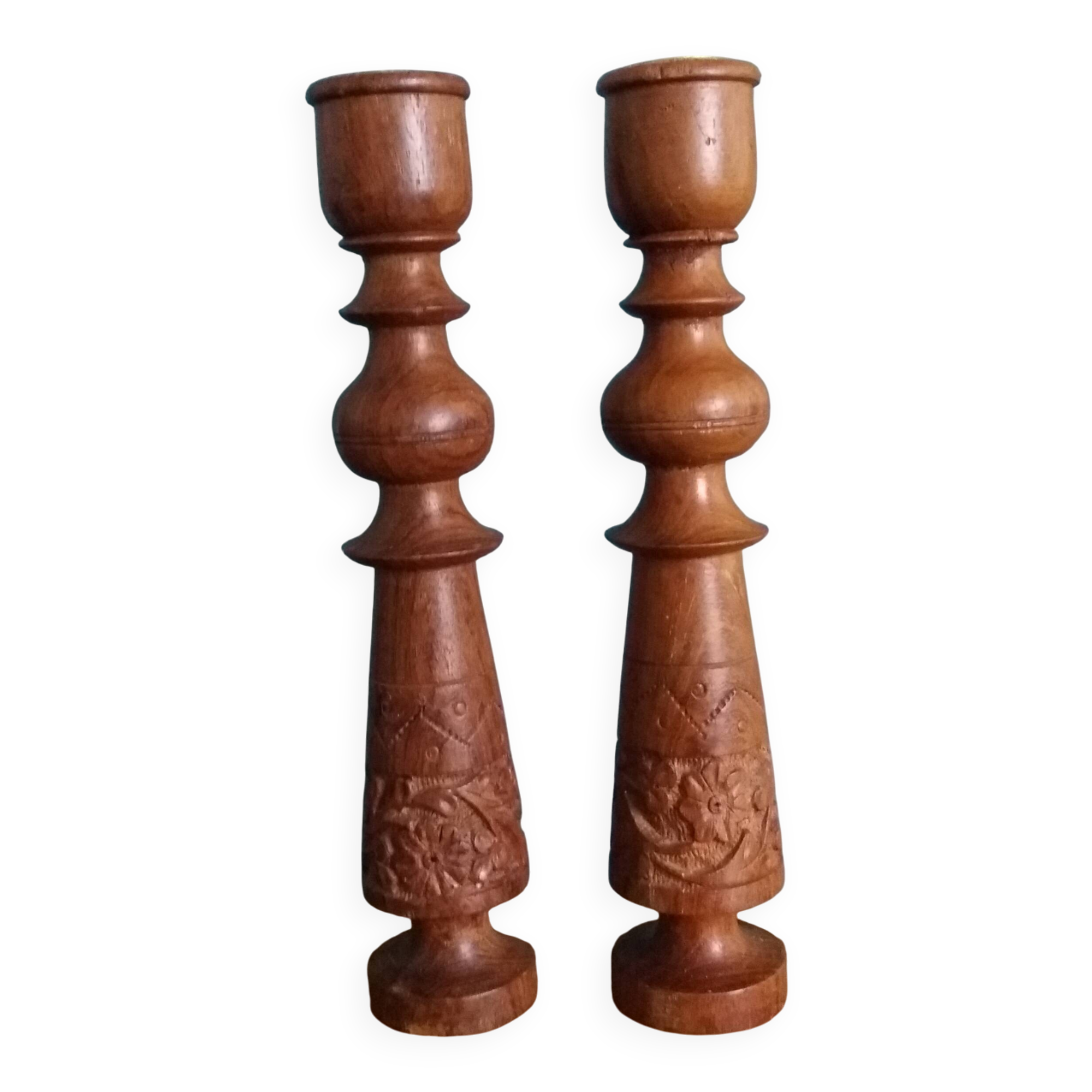 Bohemian candle holders made of turned and carved wood.
