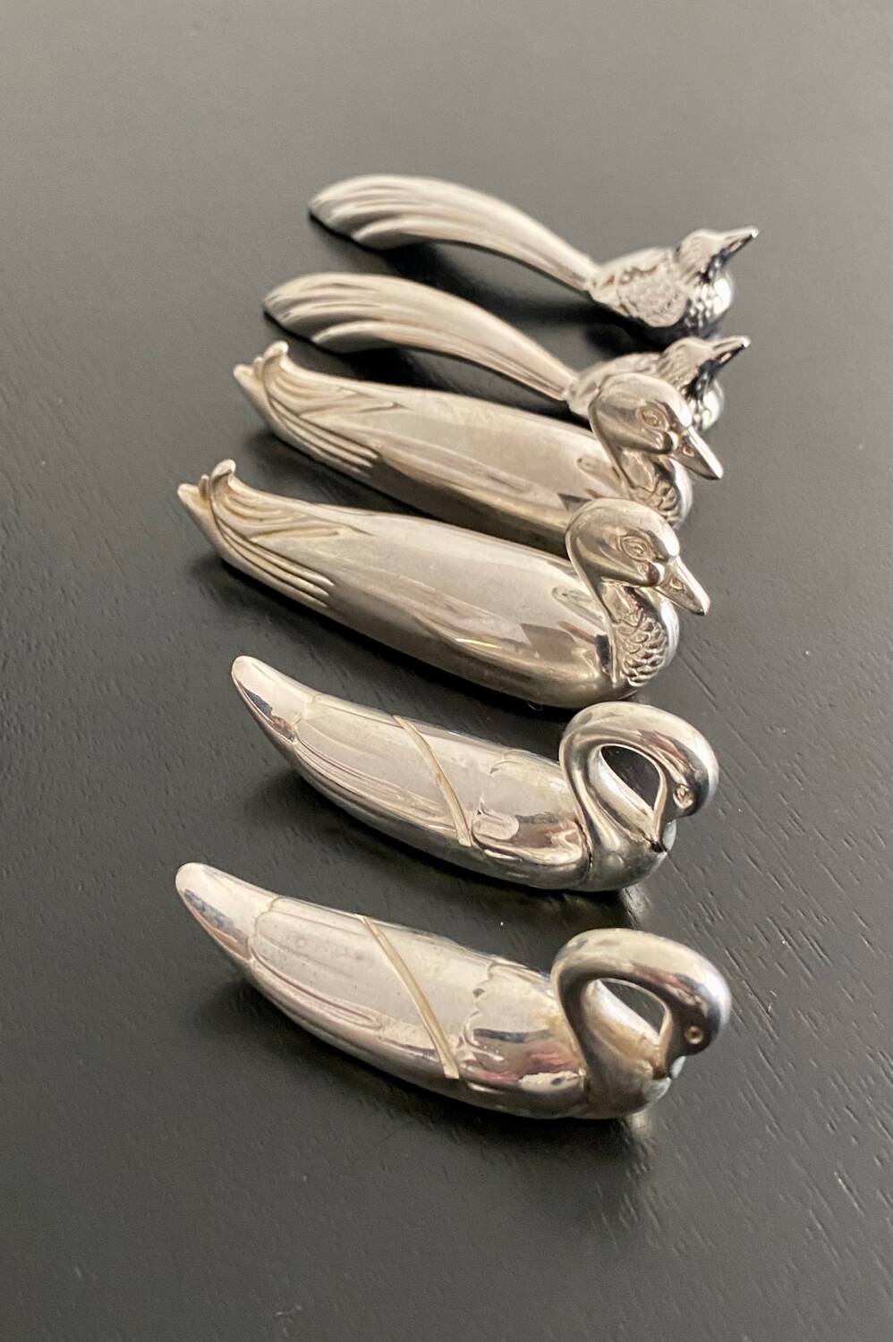 6 various animal shaped knife holders in silver metal