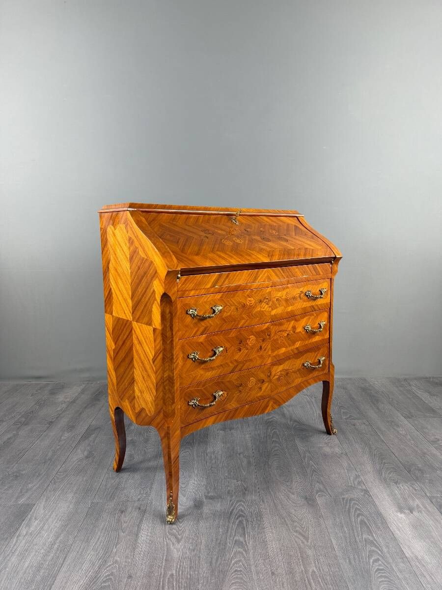 Louis XV style writing desk with a drop-leaf, made of veneer and marquetry, 19th century.