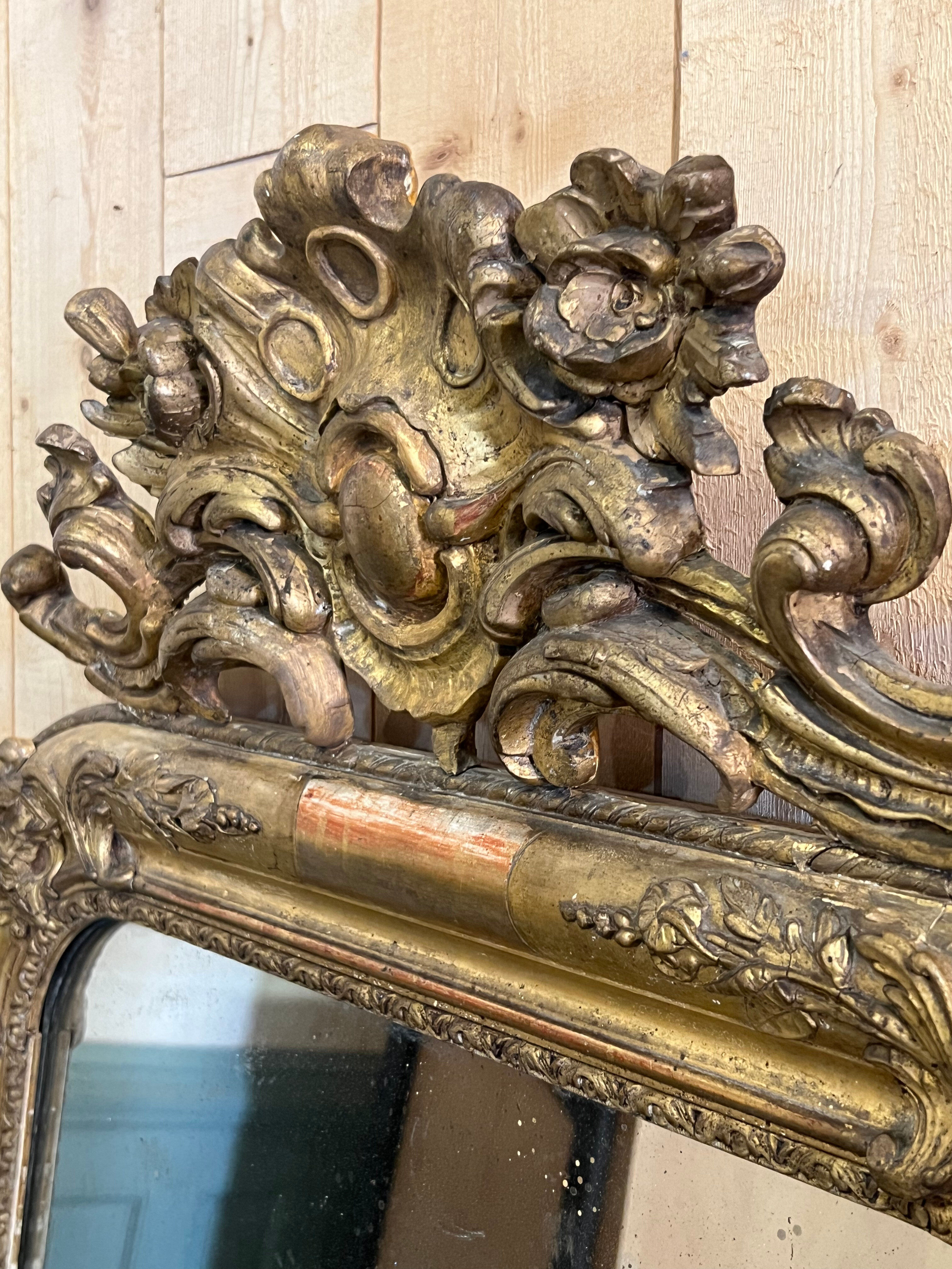 Louis Philippe mirror with a mercury pediment