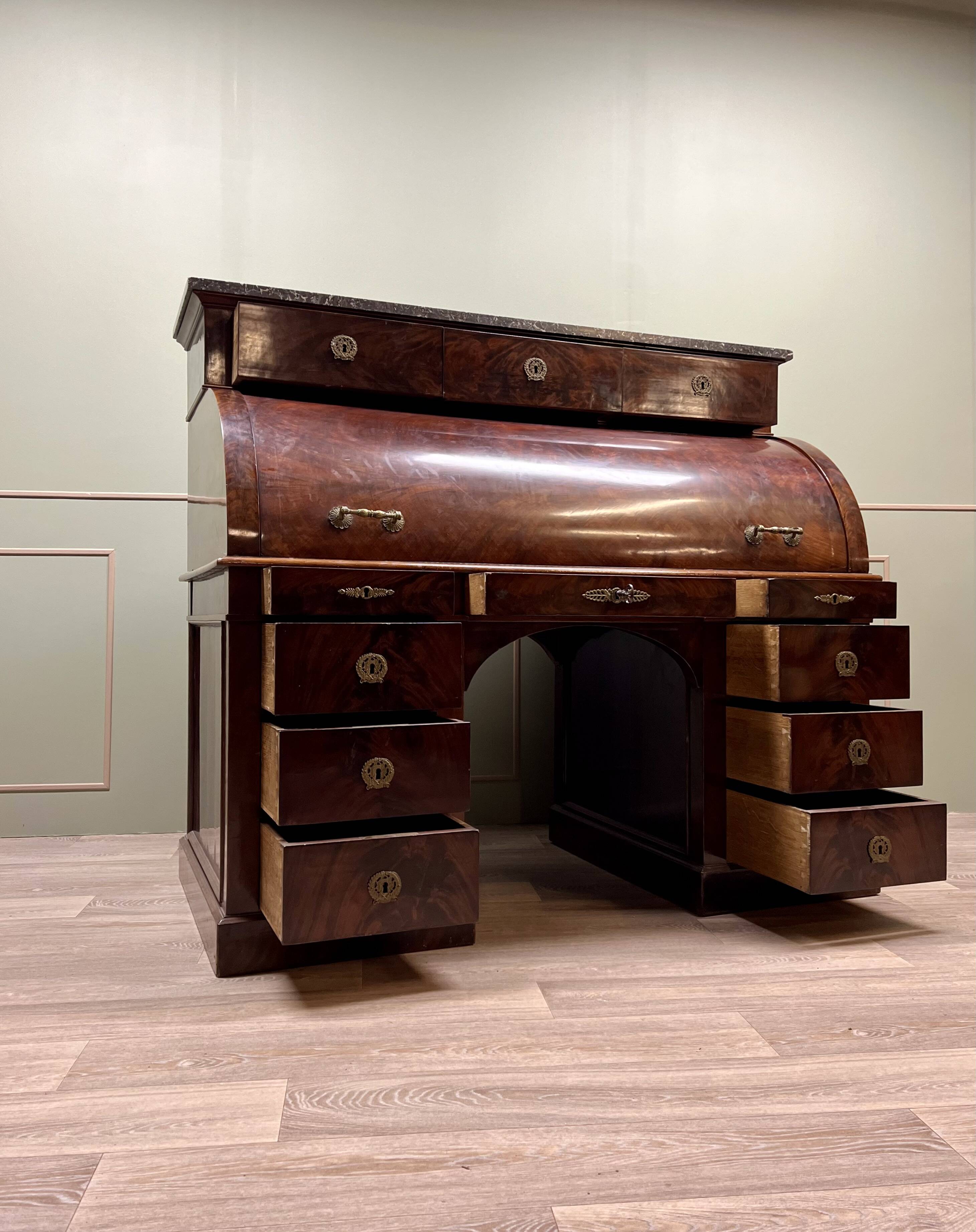 Cylinder desk in flamed mahogany empire style 19th century