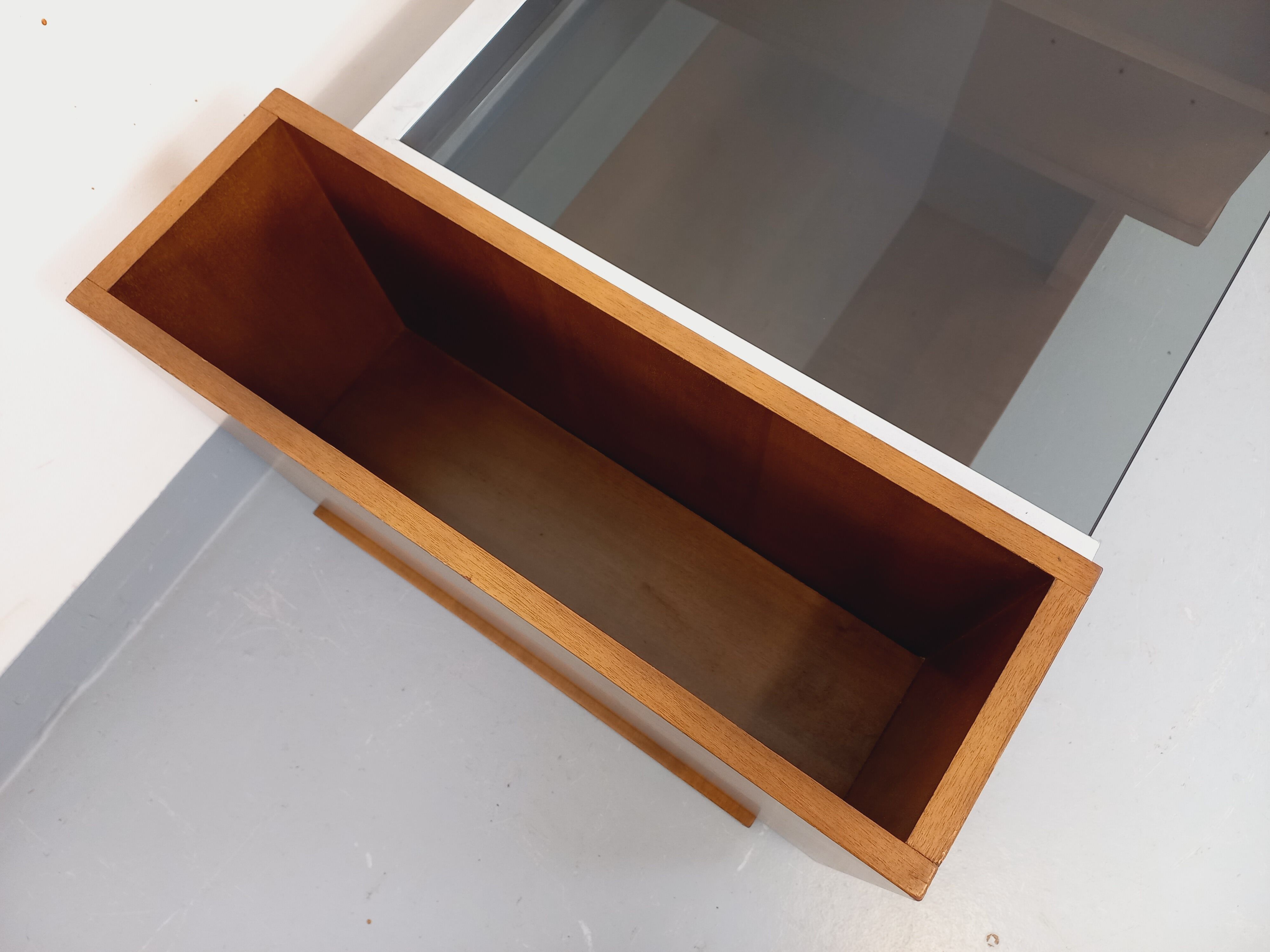 Rectangular vintage modernist coffee table with wooden niches, chrome.