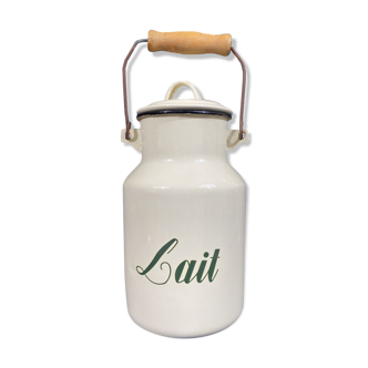 Old milk pot in vintage enamelled metal