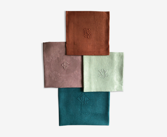 Set of four napkins dyed in multiple colors
