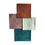 Set of four napkins dyed in multiple colors