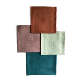 Set of four napkins dyed in multiple colors