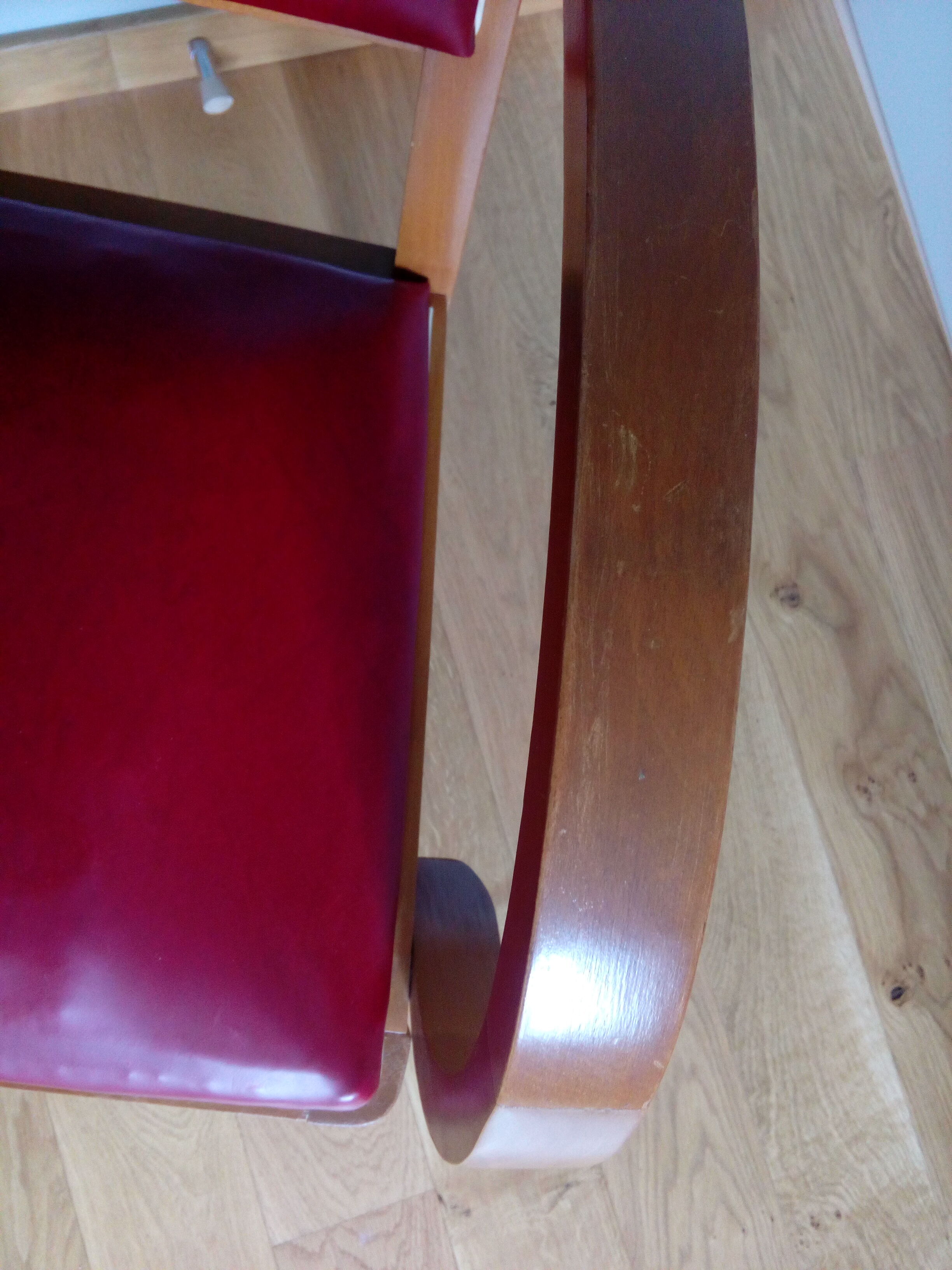 Wooden bridge chair and red skai