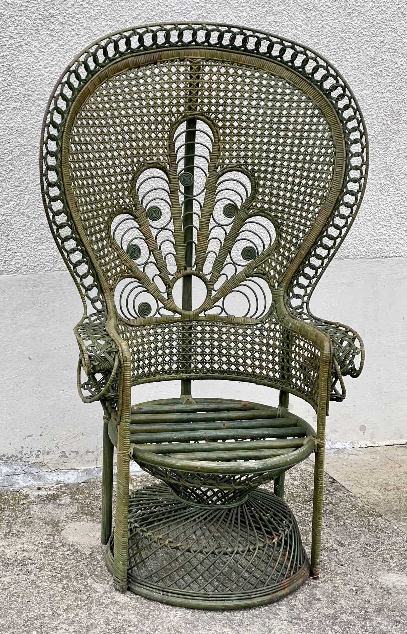 Vintage 1970s green patinated peacock rattan armchair