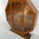 Unique octagonal Art Deco display cabinet from England.