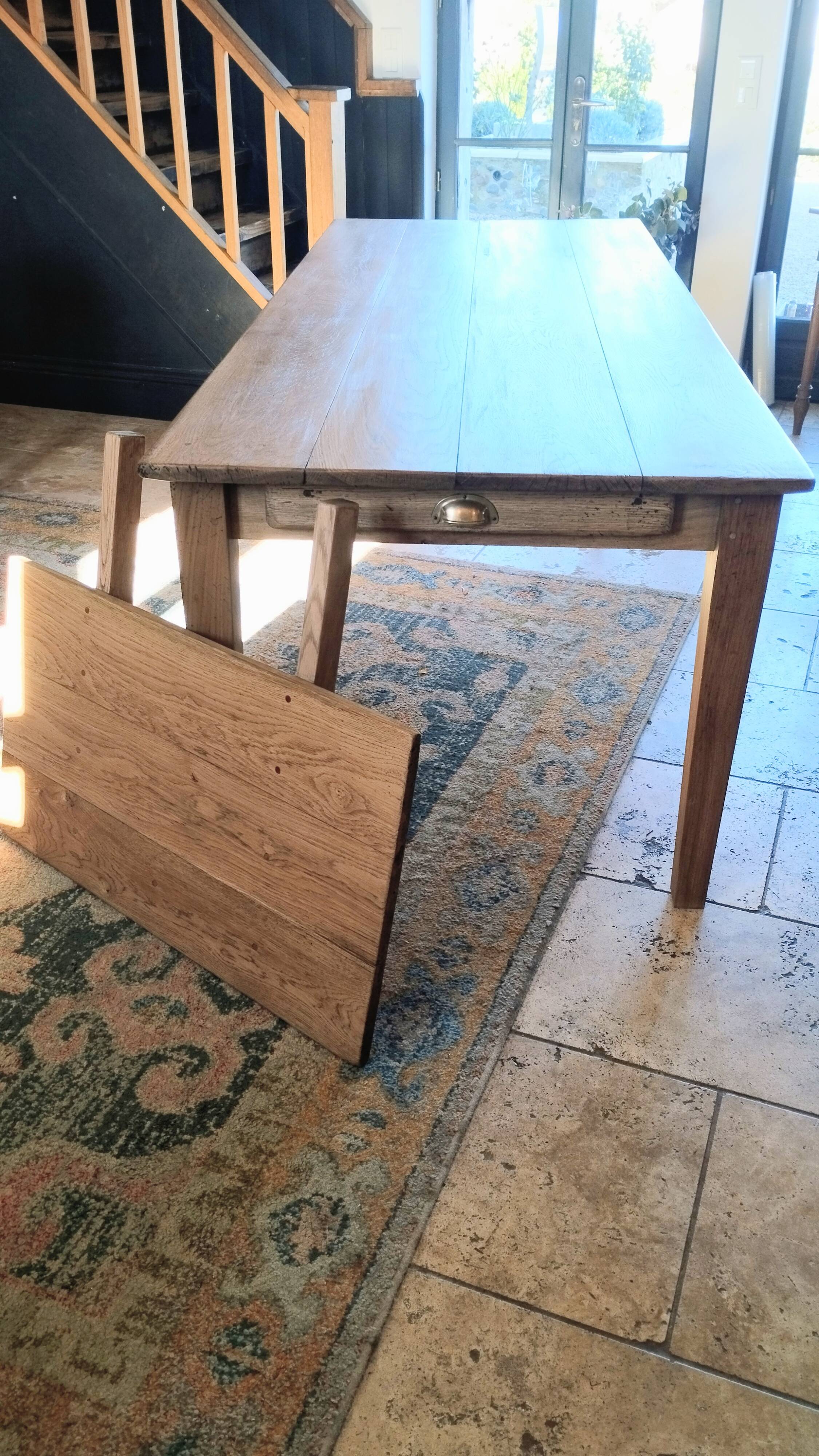 Solid oak farmhouse table with central drawer and extension