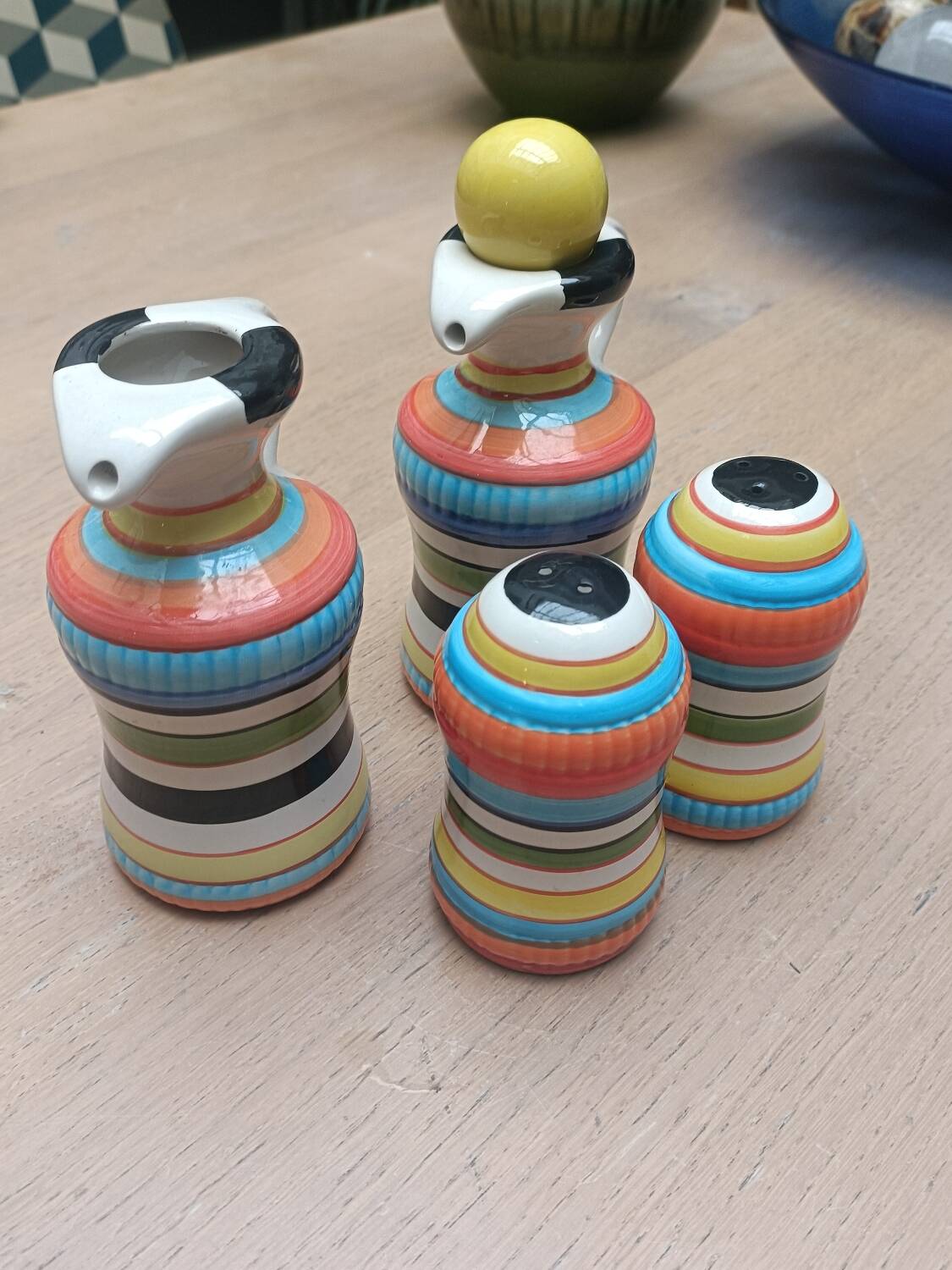 Vinegar and oil set, salt shaker and pepper shaker.