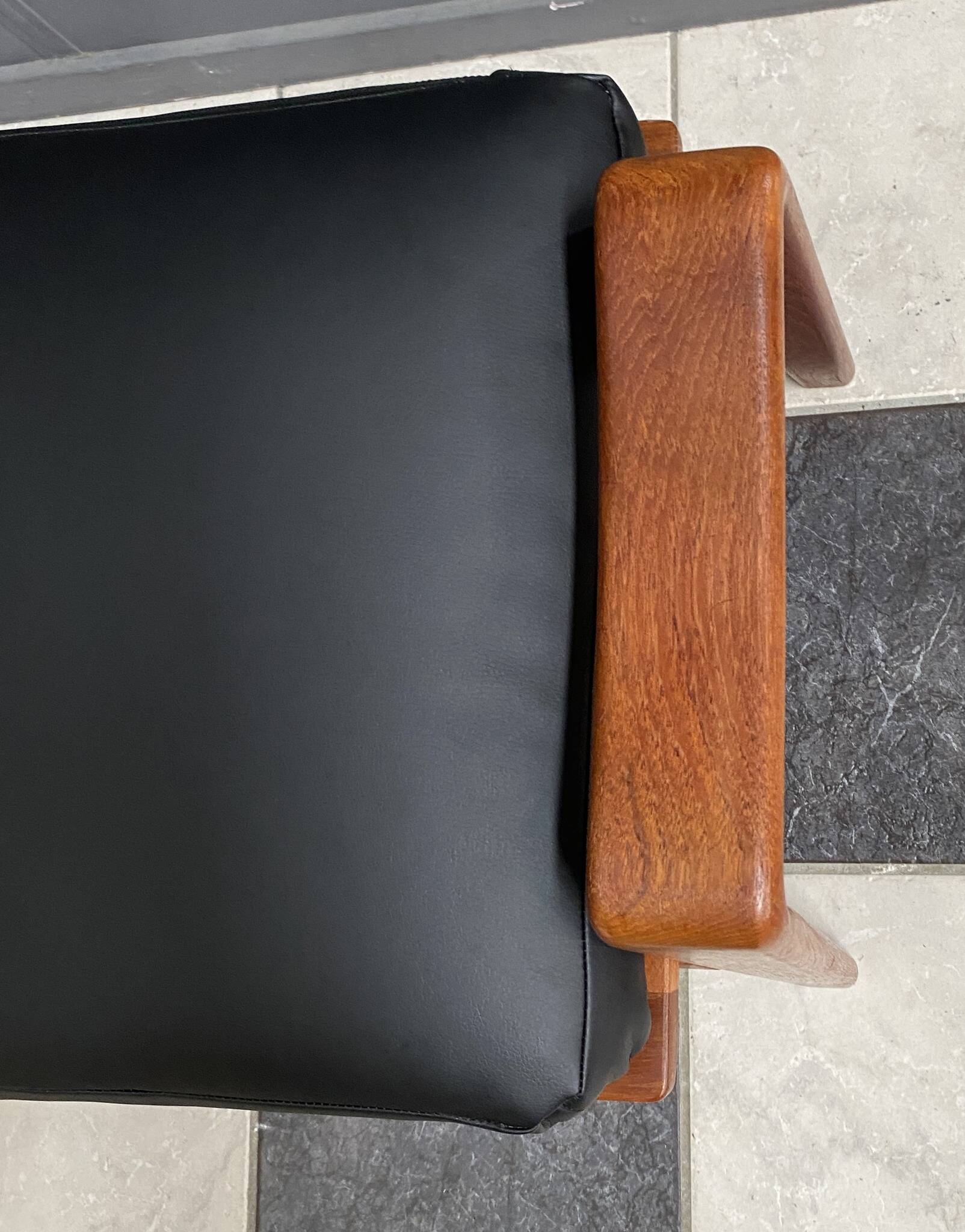 arne Wahl Iversen teak arm chair with ottoman