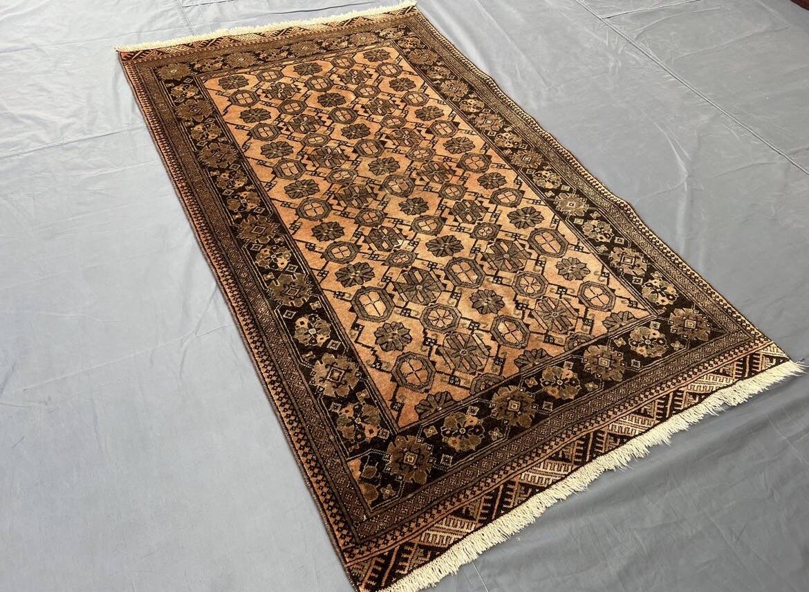 Old faded terracotta rug | Turkmen tribal wool rug