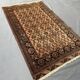 Old faded terracotta rug | Turkmen tribal wool rug